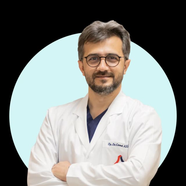 Portrait of Op. Dr. Cemal Aslan in a white coat